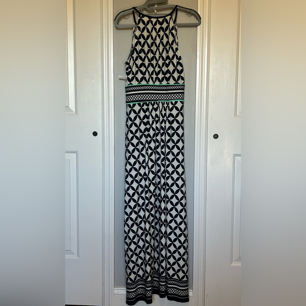 33. Sandra Darren Black and White Cut Out Maxi Dress